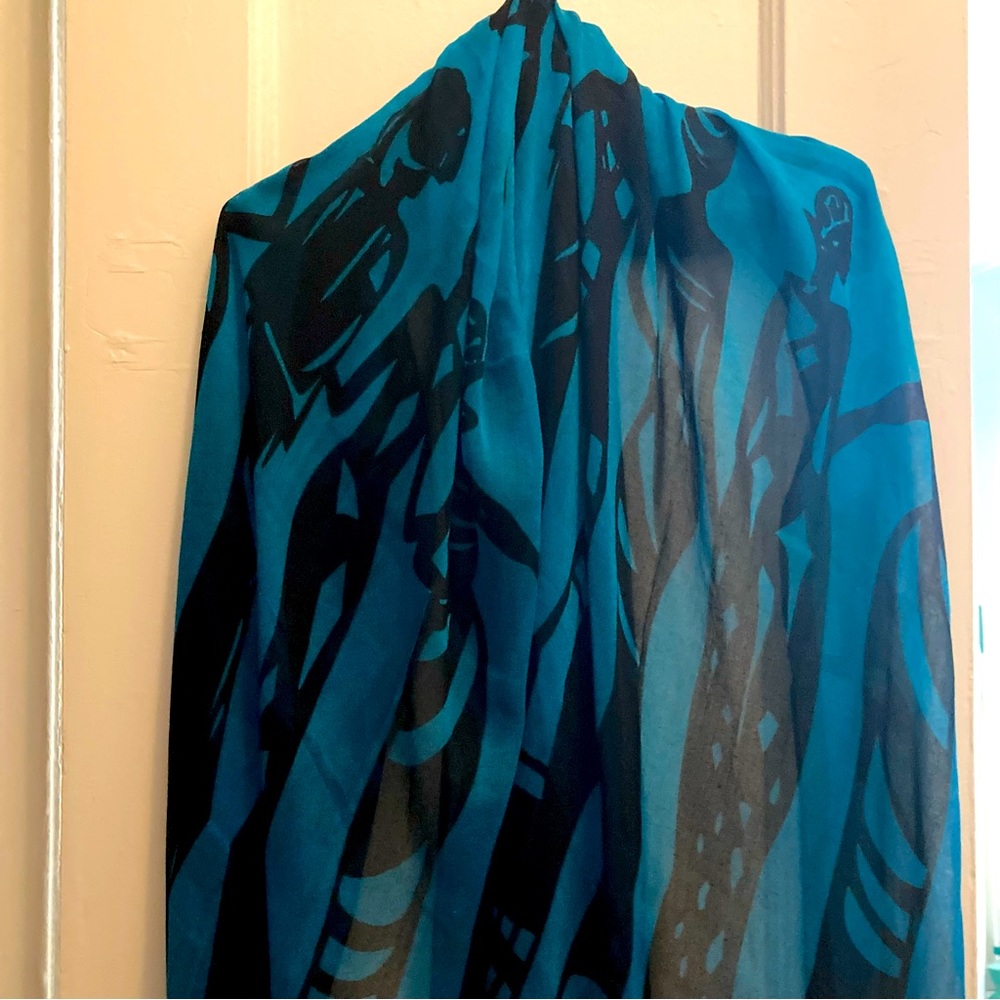 Electric Blue with silhouette design on 100% polyester chiffon 78” by 42” scarf